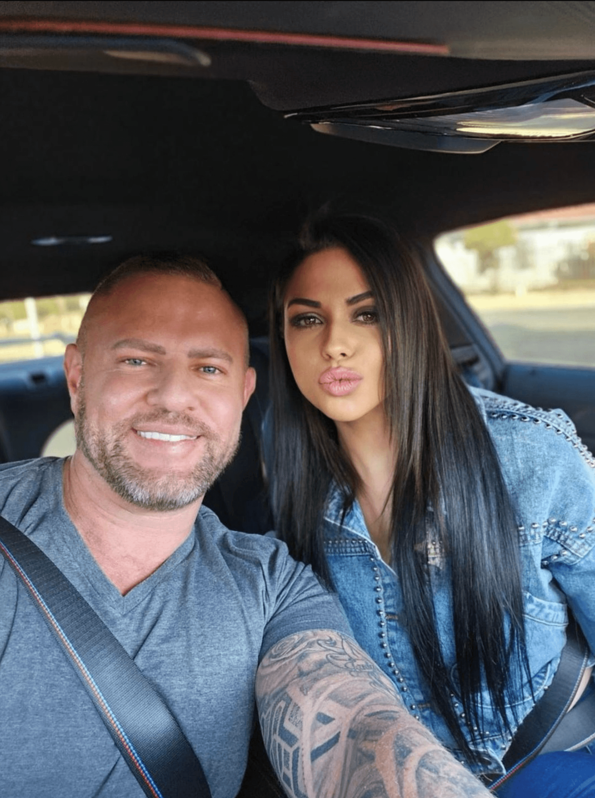Ryan Bakewell and Demi Nicolaides in luxury car